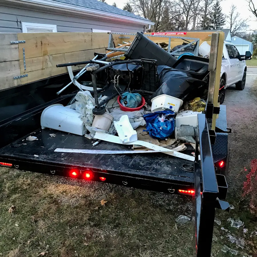 Roll-off dumpster delivered to a residential driveway in Lenoir City