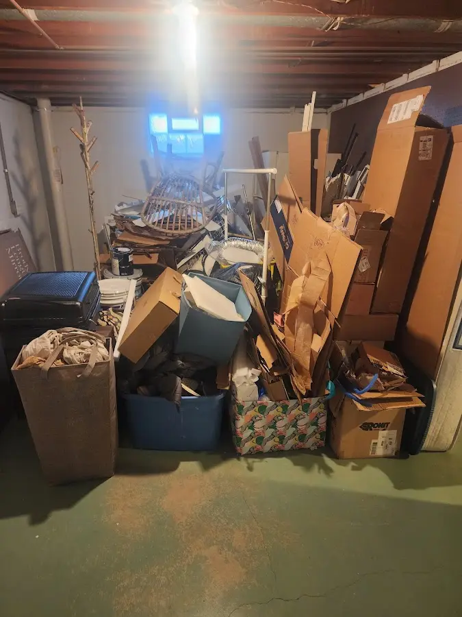 Roll-off dumpster container at job site for Yard Waste Dumpster Rental in Lenoir City